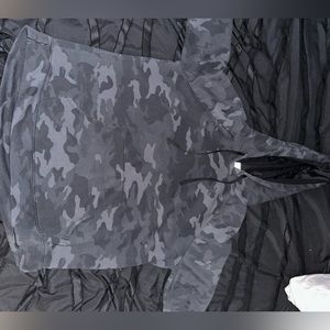 It is a black camouflage hoodie. Size large.